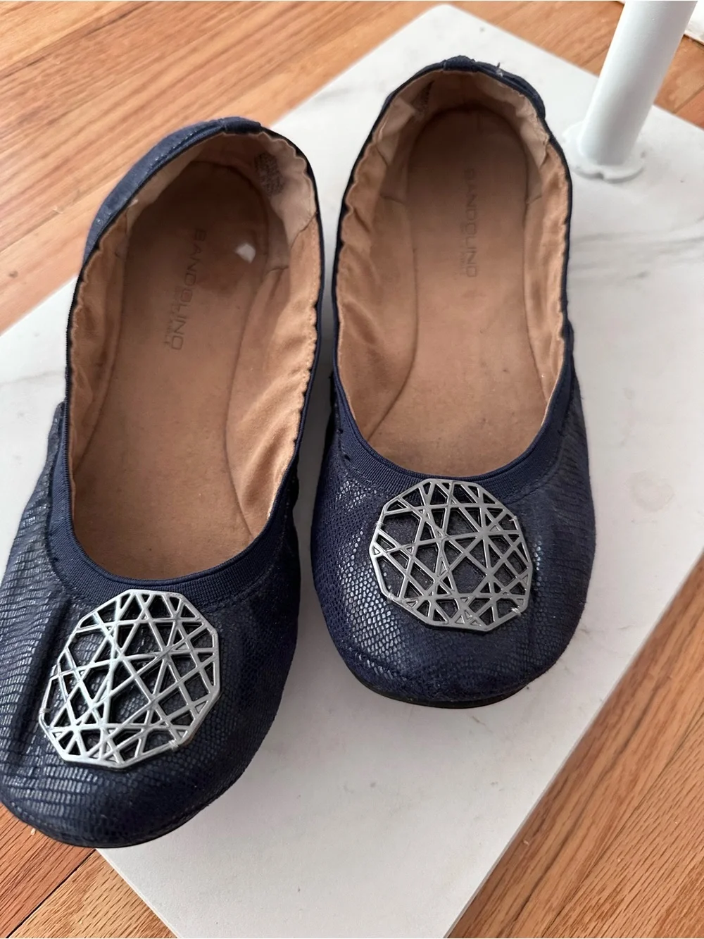 Bandolino Navy Ballet Flats with Silver Geometric Medallion